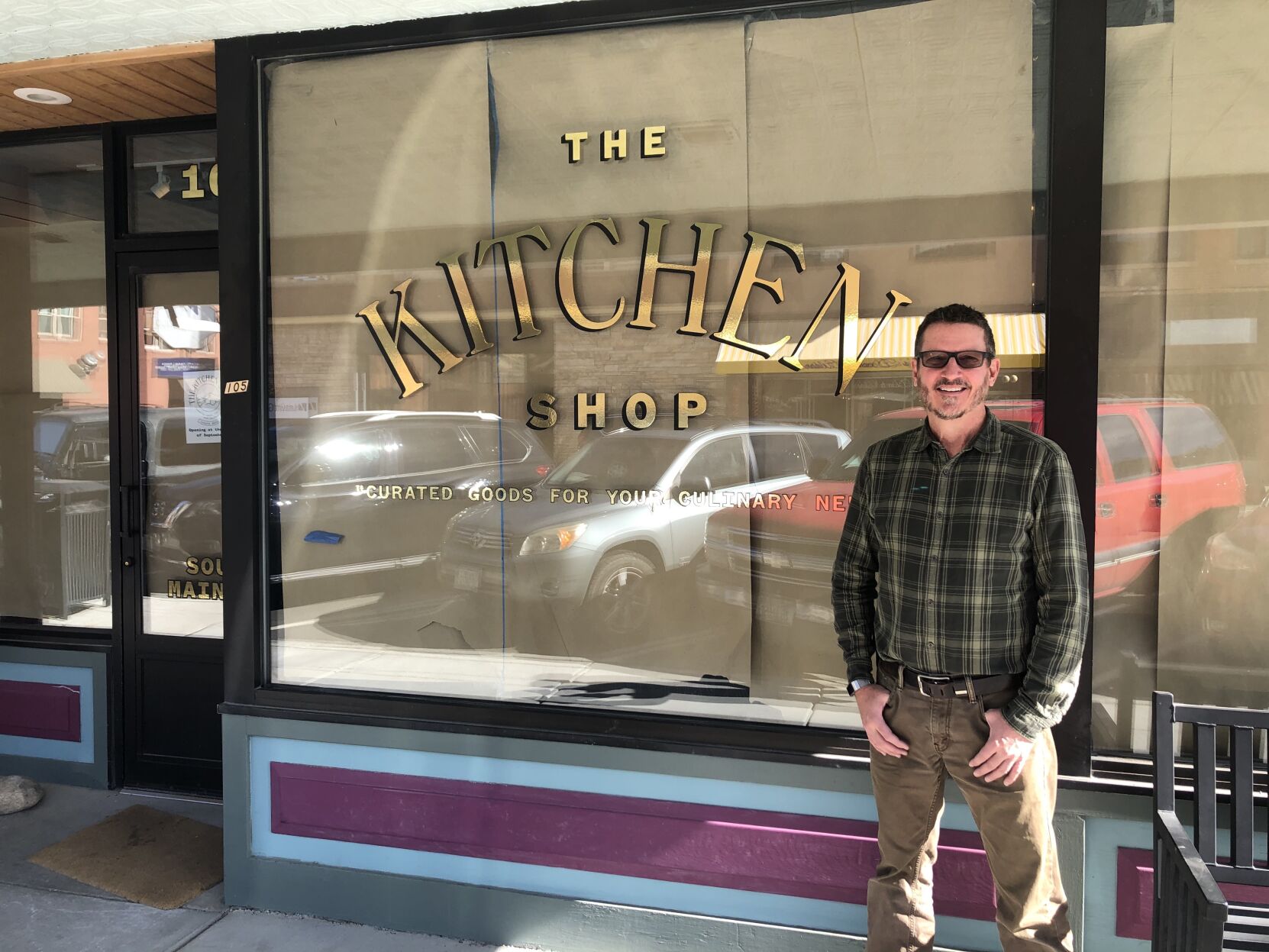 Dale Hopkins standing outside of The Kitchen Shop before the grand opening.
